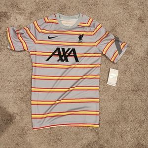 Mike Liverpool pre match raglan too jersey